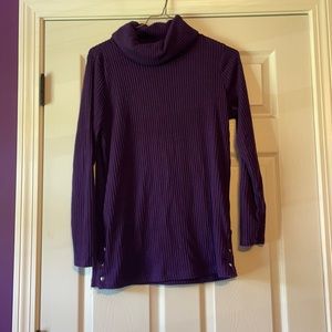 A purple sweater